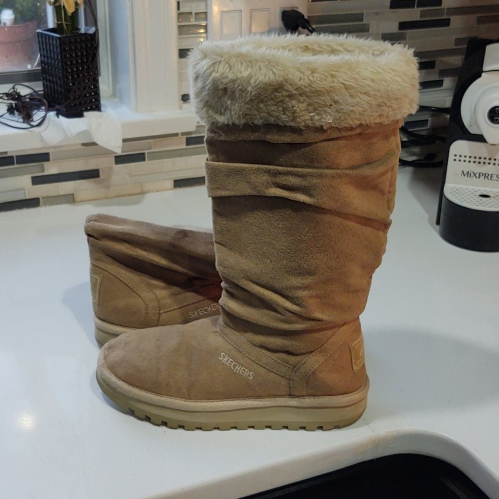 Knee length boot